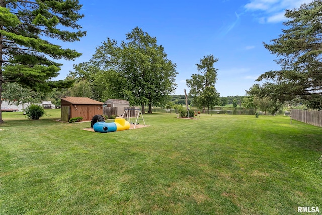25622 1st Ave N, Hillsdale, IL 61257 - view of yard featuring a shed and a water view
