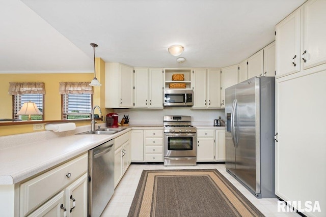 14325 139th Avenue Ct W, Taylor Ridge, IL 61284 - kitchen featuring stainless steel appliances, a peninsula, open shelves, hanging light fixtures, and light countertops