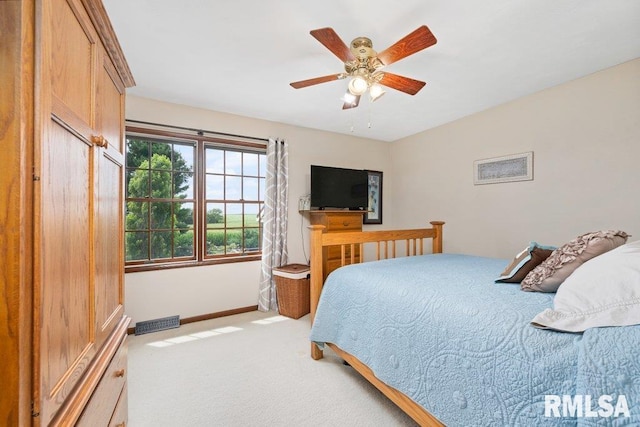 14325 139th Avenue Ct W, Taylor Ridge, IL 61284 - bedroom featuring carpet floors and a ceiling fan