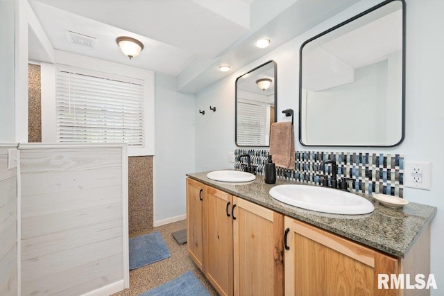 14325 139th Avenue Ct W, Taylor Ridge, IL 61284 - bathroom featuring double vanity and baseboards