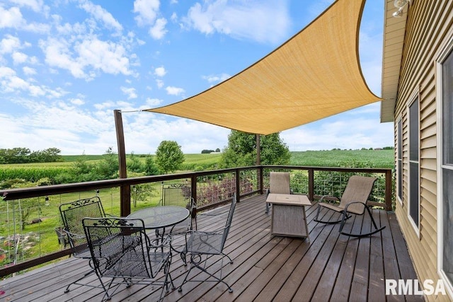 14325 139th Avenue Ct W, Taylor Ridge, IL 61284 - wooden terrace with a view of countryside and outdoor dining area
