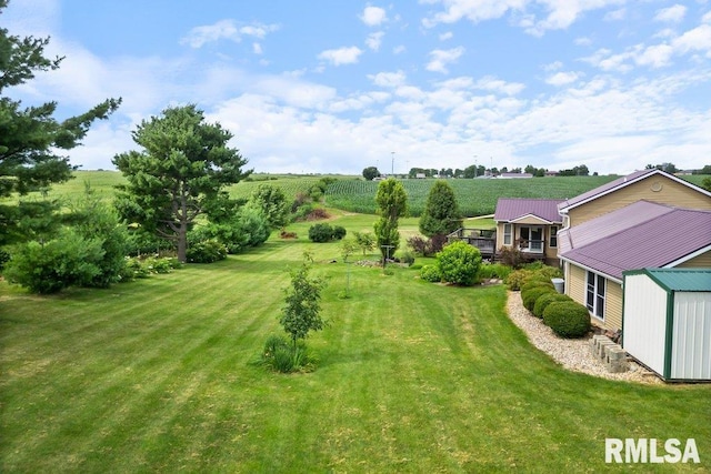 14325 139th Avenue Ct W, Taylor Ridge, IL 61284 - view of green lawn featuring an outbuilding