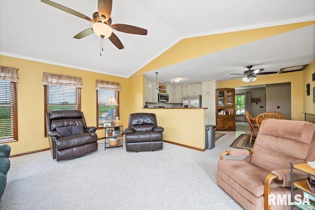 14325 139th Avenue Ct W, Taylor Ridge, IL 61284 - living room featuring a ceiling fan, lofted ceiling, light carpet, and crown molding