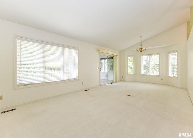 3439 Maple Glen Dr, Bettendorf, IA 52722 - unfurnished room with a chandelier, carpet, and vaulted ceiling