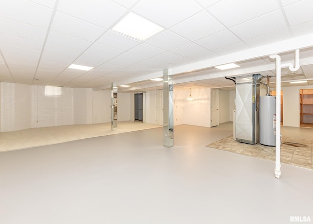 3439 Maple Glen Dr, Bettendorf, IA 52722 - finished basement featuring water heater and a paneled ceiling