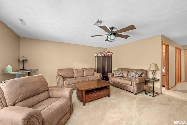 2809 12th Ave Unit 504, Rock Island, IL 61201 - living area featuring a ceiling fan and light colored carpet