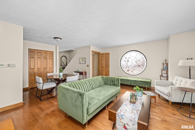 2809 12th Ave Unit 504, Rock Island, IL 61201 - living room featuring light wood finished floors and baseboards