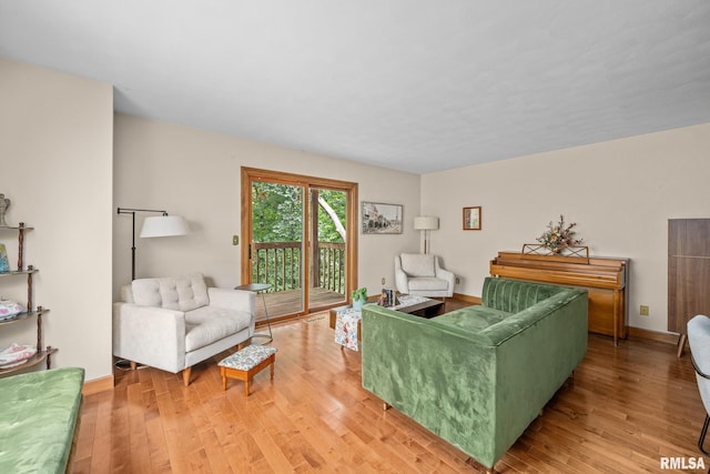 2809 12th Ave Unit 504, Rock Island, IL 61201 - living room with light wood finished floors and baseboards