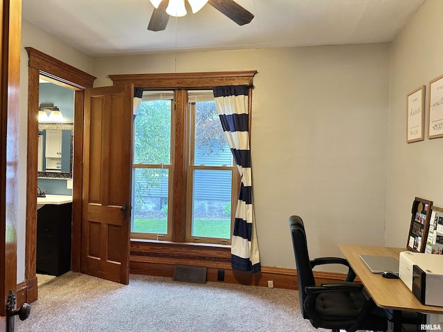 653 Ferry Rd, Miles, IA 52064 - carpeted office space with ceiling fan and a sink