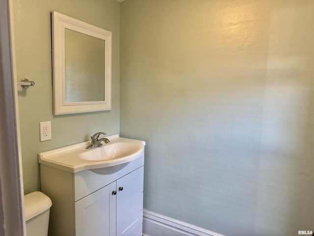 653 Ferry Rd, Miles, IA 52064 - bathroom with vanity and toilet