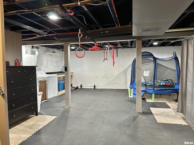 653 Ferry Rd, Miles, IA 52064 - unfinished basement with washer and clothes dryer