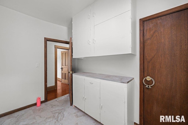 204 15th Ave, East Moline, IL 61244 - kitchen featuring light countertops and white cabinets