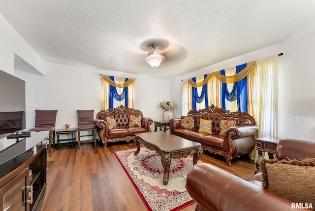 531 32nd Ave, East Moline, IL 61244 - living area with dark wood-style flooring and a ceiling fan