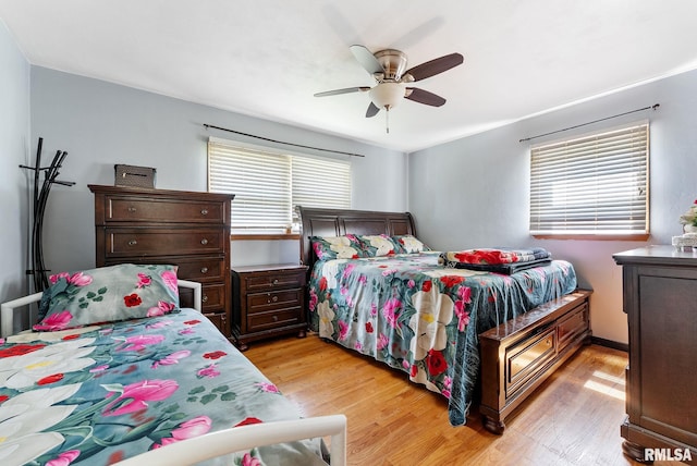 531 32nd Ave, East Moline, IL 61244 - bedroom featuring light wood-style flooring and a ceiling fan