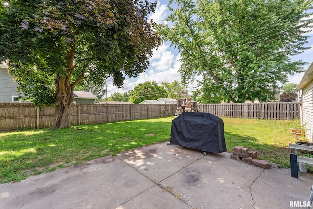 531 32nd Ave, East Moline, IL 61244 - fenced backyard with a patio area and area for grilling