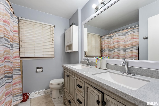 531 32nd Ave, East Moline, IL 61244 - full bathroom featuring double vanity and marble finish floors