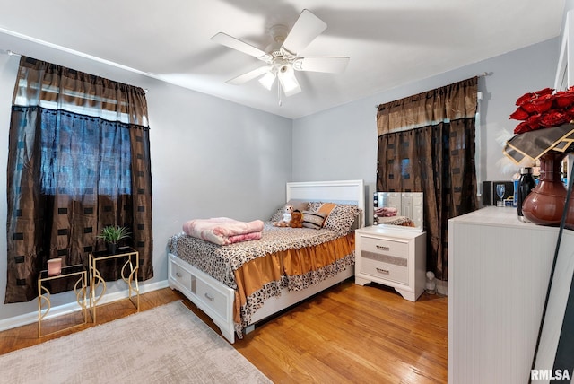 531 32nd Ave, East Moline, IL 61244 - bedroom featuring light wood-style flooring and a ceiling fan