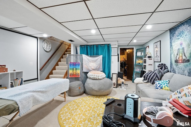 3295 Johnathan Ave, Bettendorf, IA 52722 - carpeted living area with a paneled ceiling, stairs, and recessed lighting