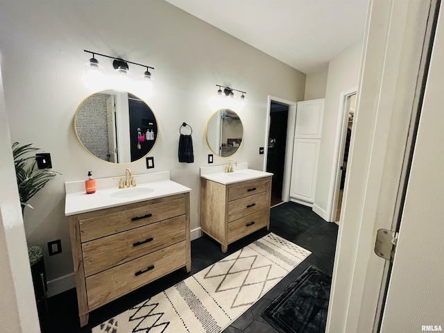 66 Windy Hill Dr, Murphysboro, IL 62966 - full bath featuring two vanities and baseboards