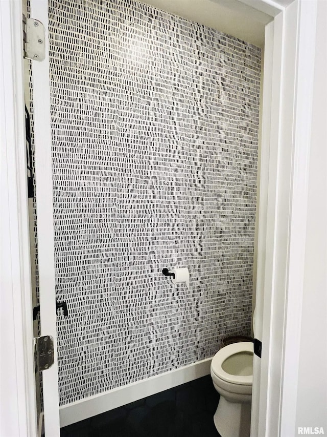 66 Windy Hill Dr, Murphysboro, IL 62966 - bathroom featuring toilet and tile walls