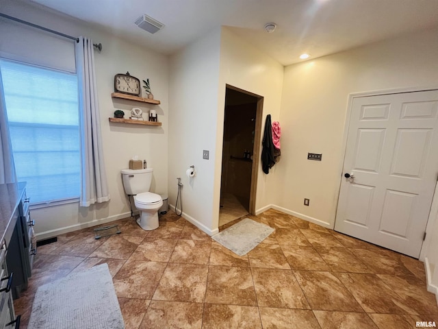 66 Windy Hill Dr, Murphysboro, IL 62966 - bathroom featuring toilet and baseboards