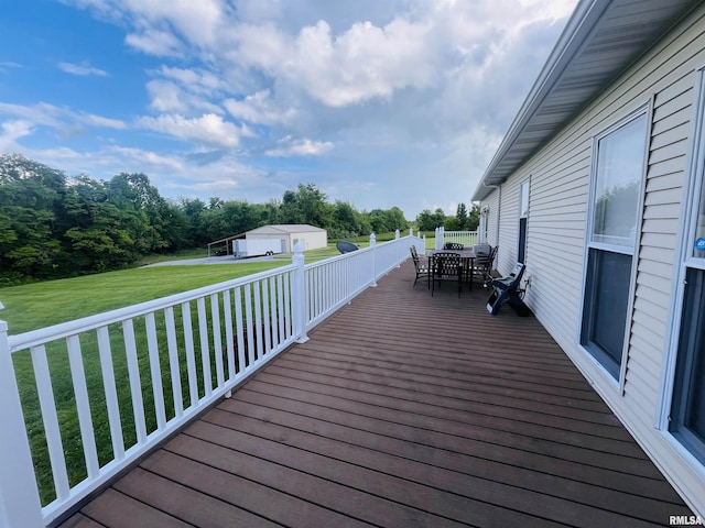 66 Windy Hill Dr, Murphysboro, IL 62966 - deck with outdoor dining space and a lawn