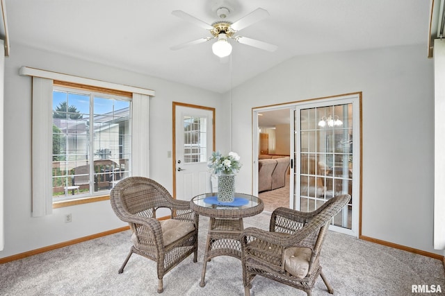 2722 Linwood Ct, Davenport, IA 52806 - carpeted dining space featuring vaulted ceiling and a ceiling fan