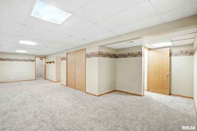 2722 Linwood Ct, Davenport, IA 52806 - basement with a paneled ceiling and carpet flooring