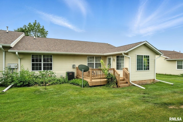 2722 Linwood Ct, Davenport, IA 52806 - rear view of house with a wooden deck, a yard, and roof with shingles