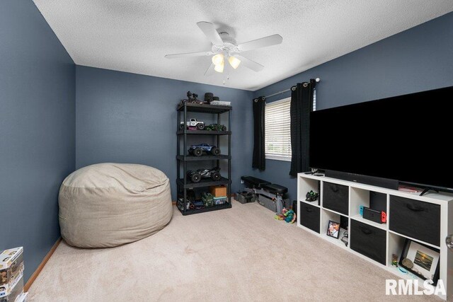 3209 S 16th Ave Unit 203, Eldridge, IA 52748 - living area with carpet, a ceiling fan, and a textured ceiling