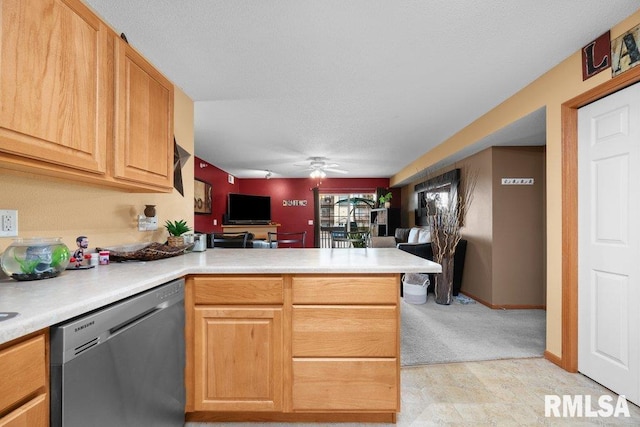 3209 S 16th Ave Unit 203, Eldridge, IA 52748 - kitchen with dishwasher, a peninsula, light countertops, and a ceiling fan