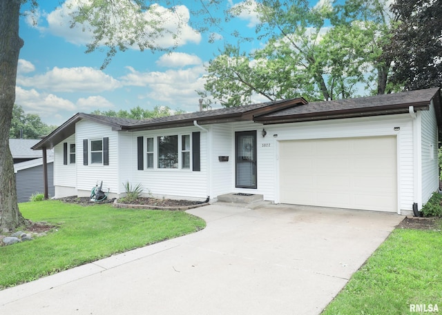 5022 Northbrook Ct, Davenport, IA 52806 - ranch-style house with a garage, driveway, and a front yard