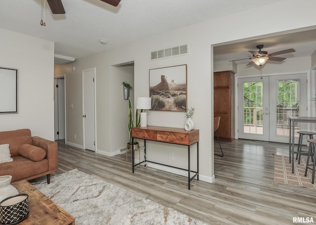 5022 Northbrook Ct, Davenport, IA 52806 - living room with ceiling fan, wood finished floors, and french doors