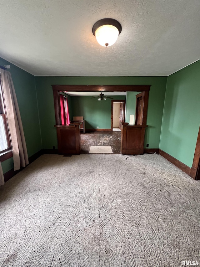 202 N Wilson St, Anna, IL 62906 - empty room with carpet flooring, a ceiling fan, and a textured ceiling