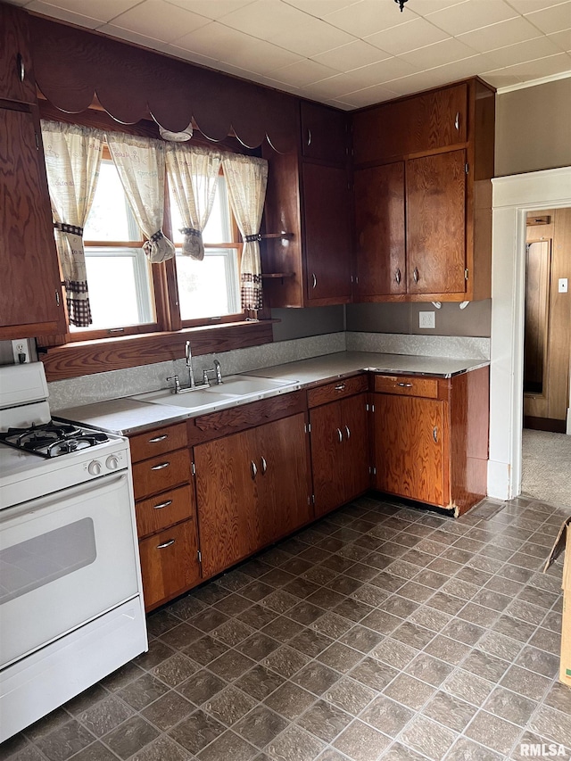 202 N Wilson St, Anna, IL 62906 - kitchen featuring gas range gas stove and light countertops