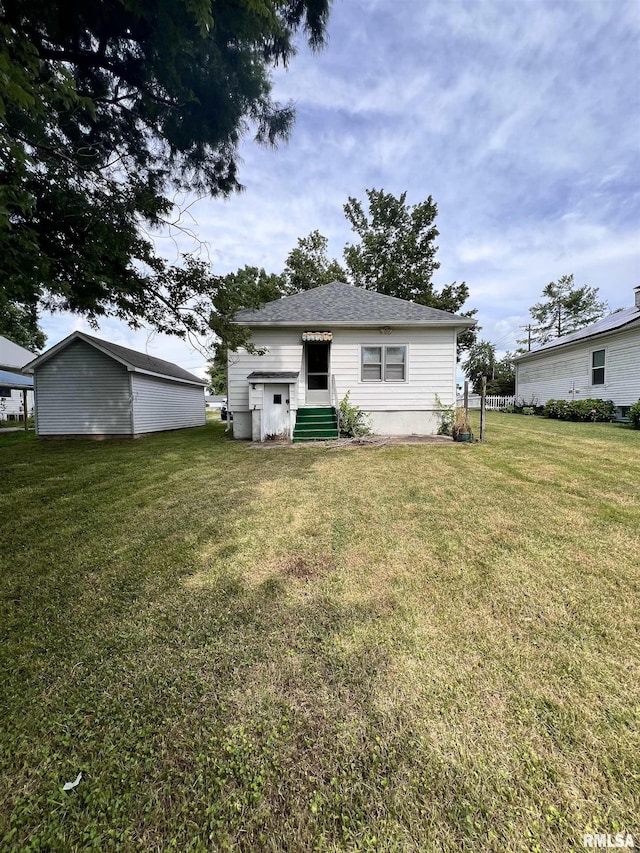 202 N Wilson St, Anna, IL 62906 - back of house with a lawn and entry steps