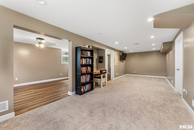 303 S Park View Dr, Park View, IA 52748 - below grade area with carpet floors, a ceiling fan, and recessed lighting