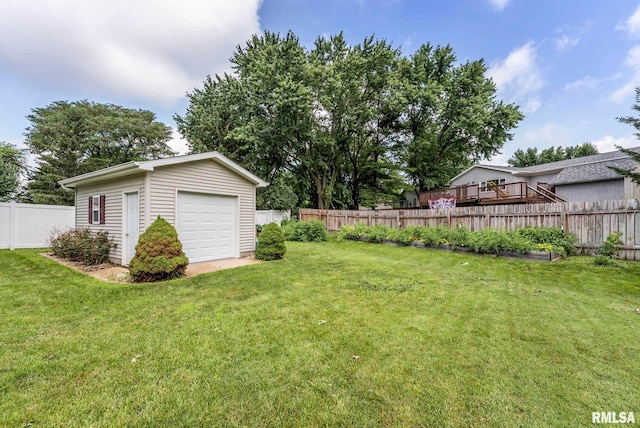 303 S Park View Dr, Park View, IA 52748 - fenced backyard featuring an outdoor structure, a detached garage, and driveway