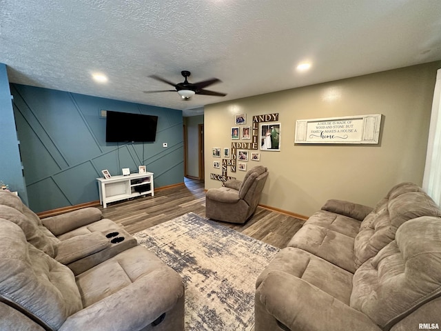 303 S Park View Dr, Park View, IA 52748 - living room featuring ceiling fan, wood finished floors, recessed lighting, and a textured ceiling