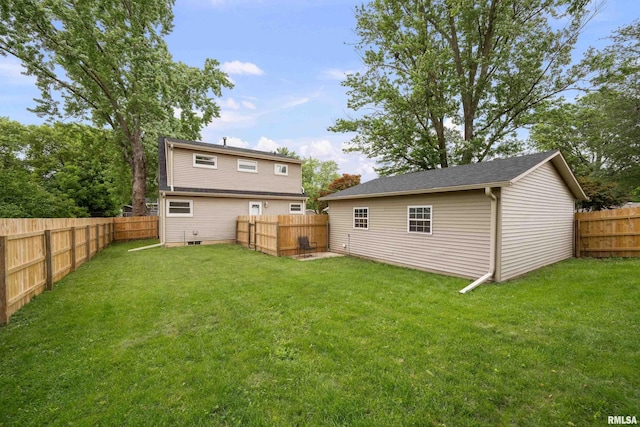 1815 Lincoln Rd, Bettendorf, IA 52722 - back of house featuring a fenced backyard