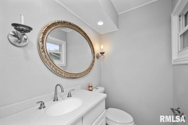 1815 Lincoln Rd, Bettendorf, IA 52722 - bathroom featuring vanity and ornamental molding