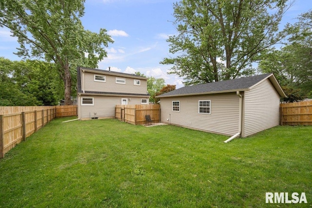 1815 Lincoln Rd, Bettendorf, IA 52722 - rear view of property with a fenced backyard