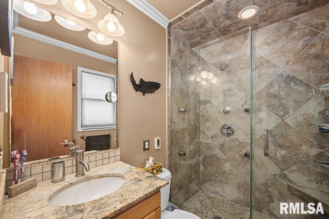 2401 W Dale Ct, Bettendorf, IA 52722 - bathroom with ornamental molding, a shower stall, and vanity