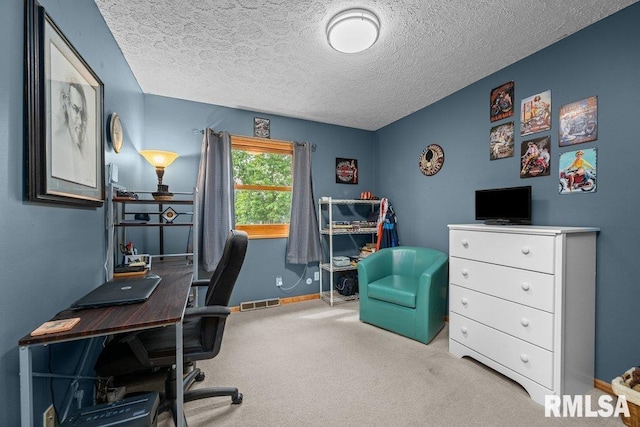 2401 W Dale Ct, Bettendorf, IA 52722 - carpeted office space with baseboards and a textured ceiling