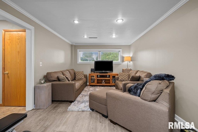 2401 W Dale Ct, Bettendorf, IA 52722 - living area with light wood-type flooring, ornamental molding, and recessed lighting