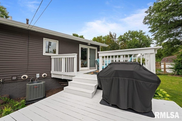 2401 W Dale Ct, Bettendorf, IA 52722 - wooden deck featuring a grill