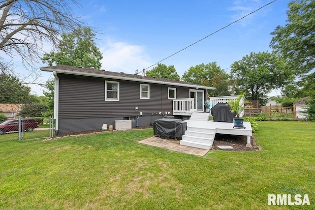2401 W Dale Ct, Bettendorf, IA 52722 - rear view of house with a deck