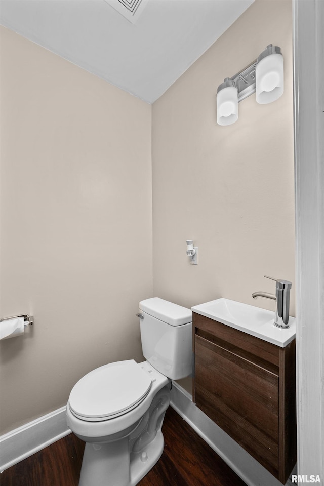 1114 E 15th St, Davenport, IA 52803 - half bath with vanity and wood finished floors