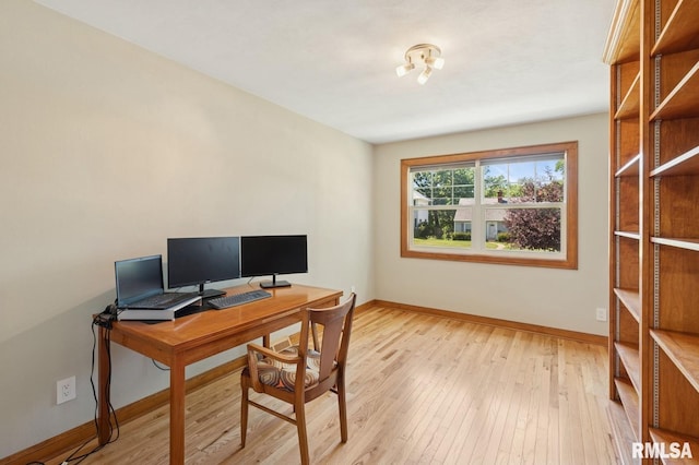 1928 Elm St, Davenport, IA 52803 - office area featuring baseboards and light wood-style flooring