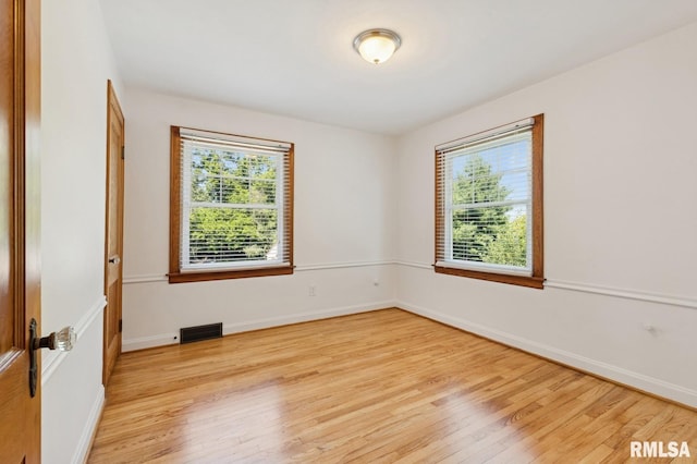 1928 Elm St, Davenport, IA 52803 - empty room featuring light wood-style flooring